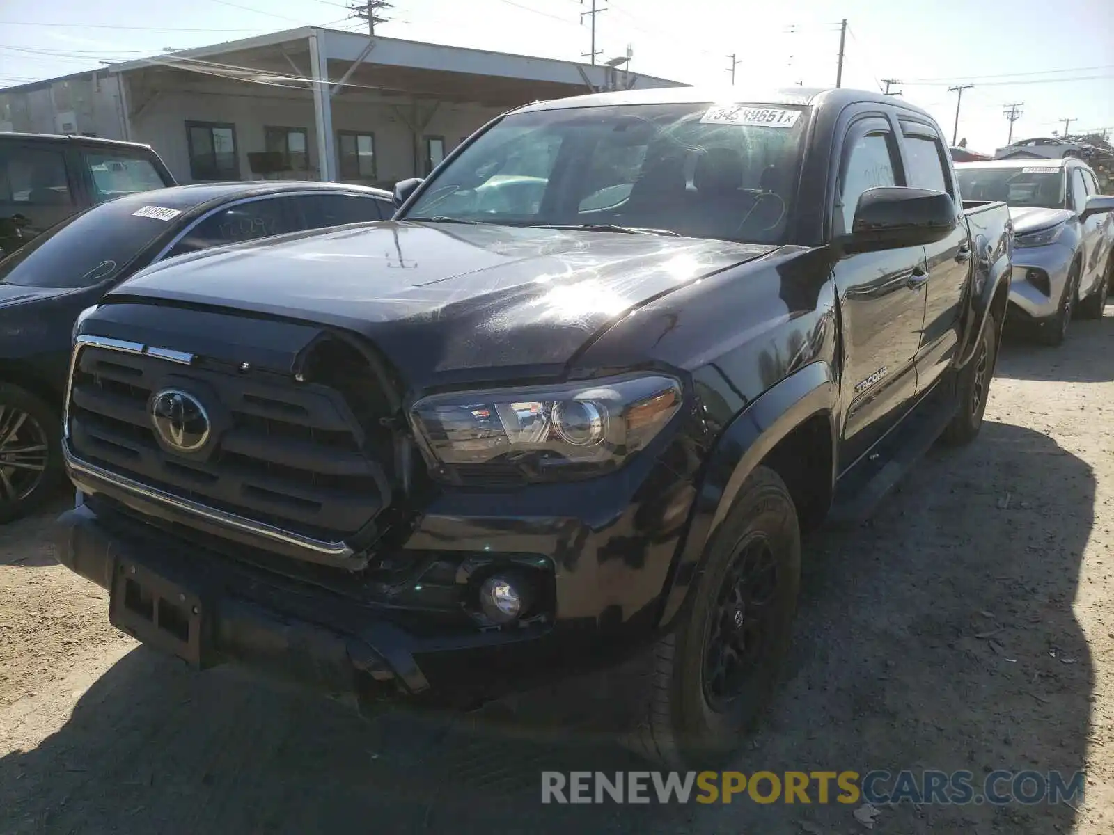 2 Photograph of a damaged car 3TMAZ5CN9KM096435 TOYOTA TACOMA 2019