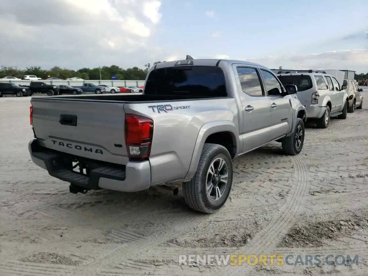 4 Photograph of a damaged car 3TMAZ5CN9KM096712 TOYOTA TACOMA 2019