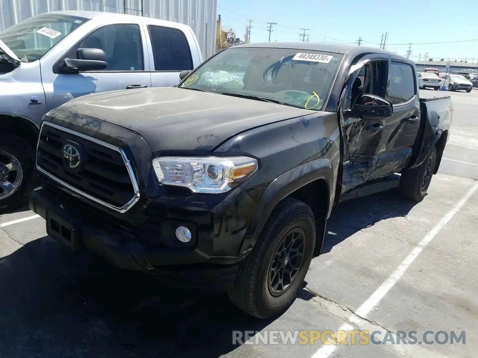 2 Photograph of a damaged car 3TMAZ5CN9KM099657 TOYOTA TACOMA 2019