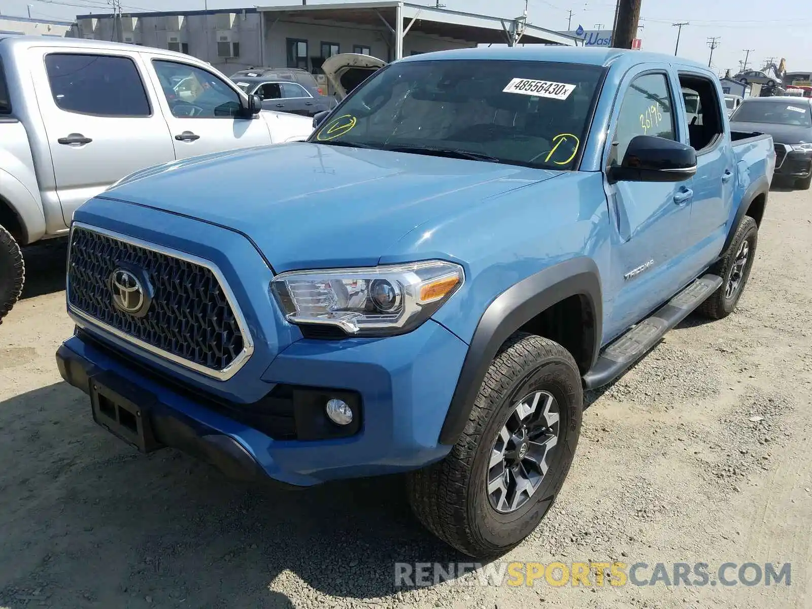 2 Photograph of a damaged car 3TMAZ5CN9KM101245 TOYOTA TACOMA 2019