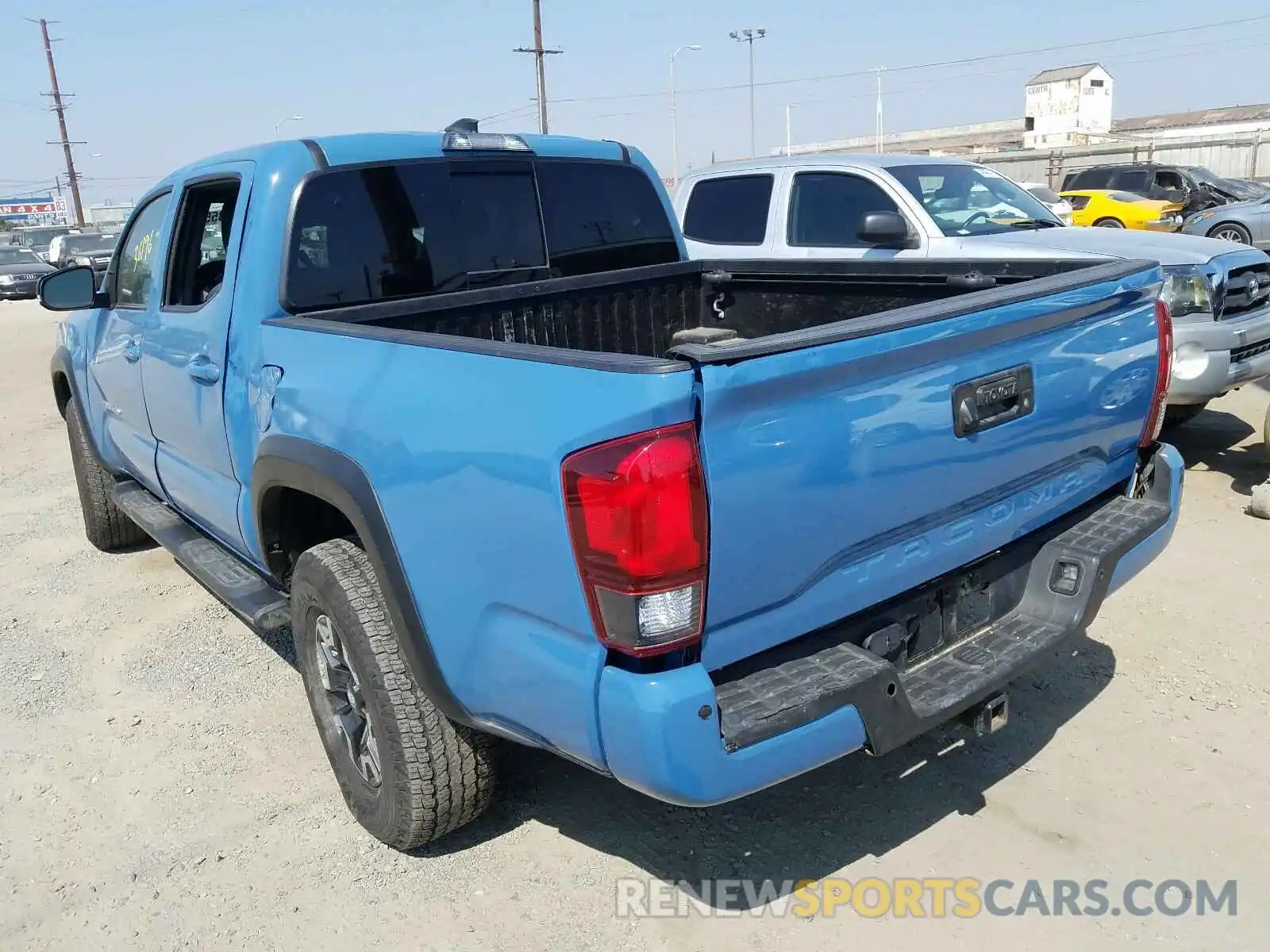 3 Photograph of a damaged car 3TMAZ5CN9KM101245 TOYOTA TACOMA 2019