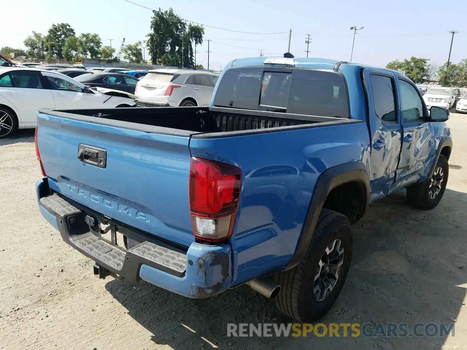 4 Photograph of a damaged car 3TMAZ5CN9KM101245 TOYOTA TACOMA 2019