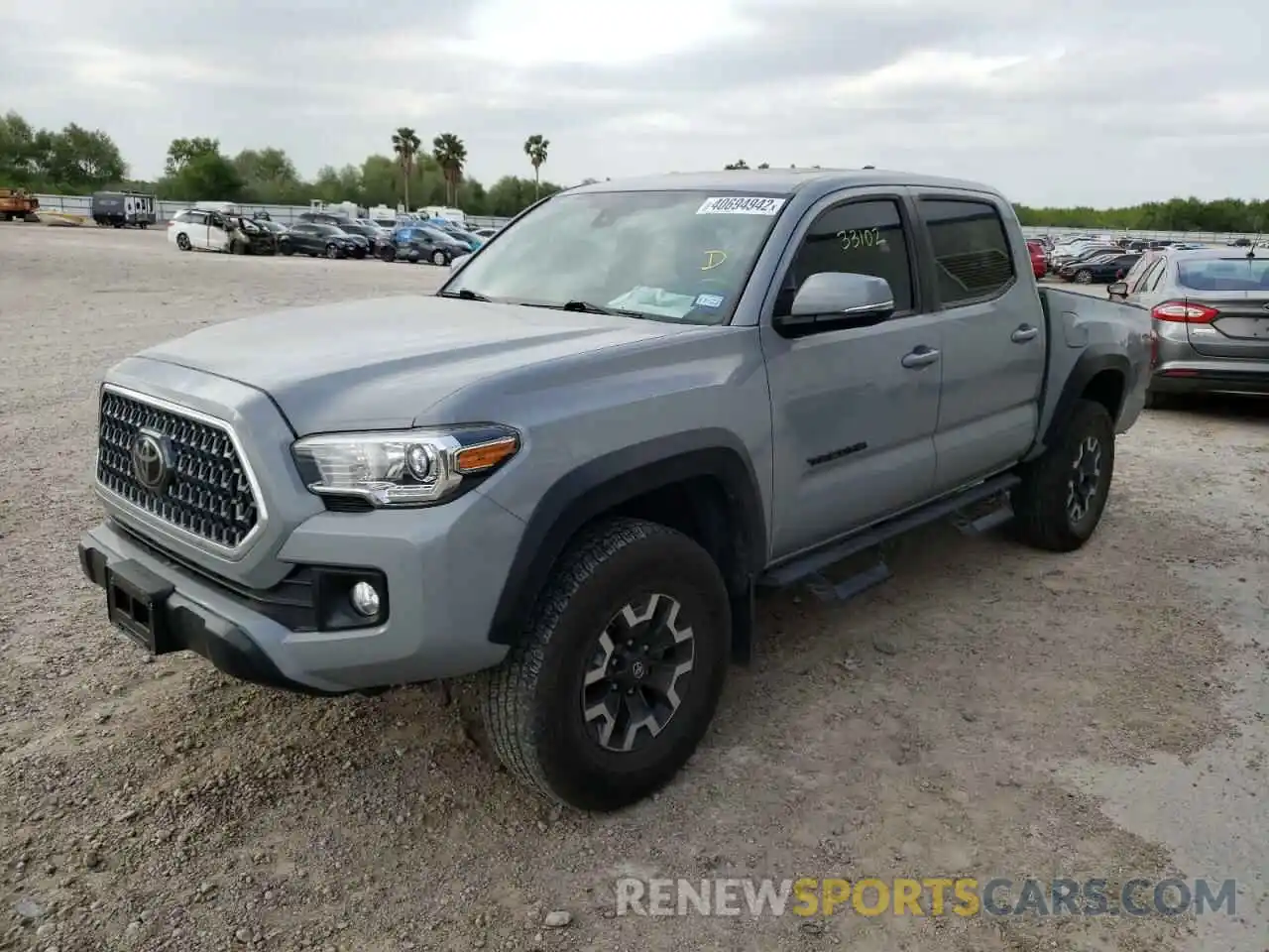 2 Photograph of a damaged car 3TMAZ5CN9KM101357 TOYOTA TACOMA 2019