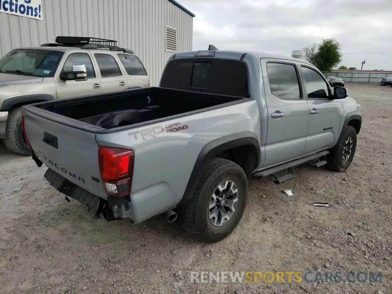 4 Photograph of a damaged car 3TMAZ5CN9KM101357 TOYOTA TACOMA 2019