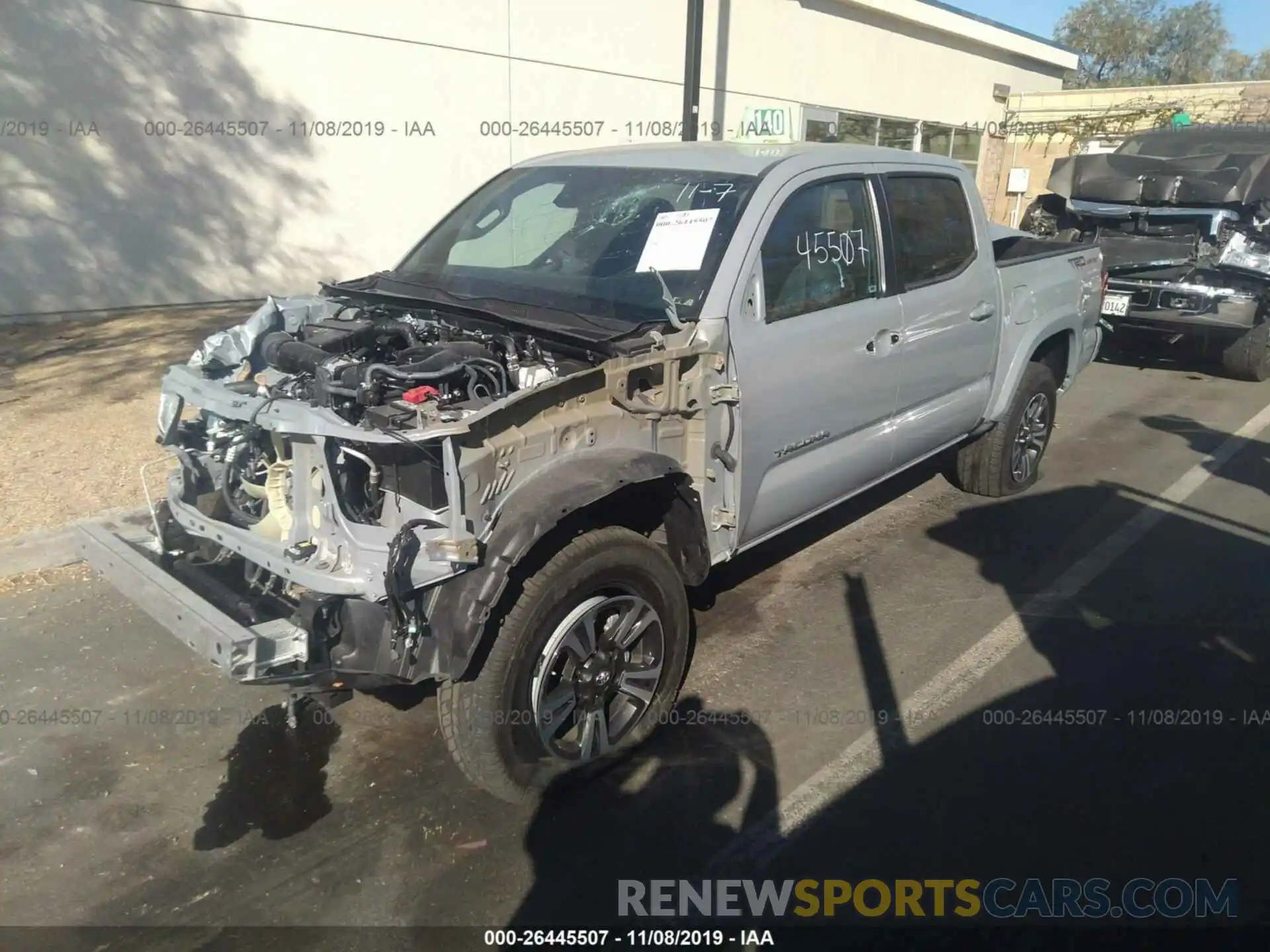 2 Photograph of a damaged car 3TMAZ5CN9KM101603 TOYOTA TACOMA 2019