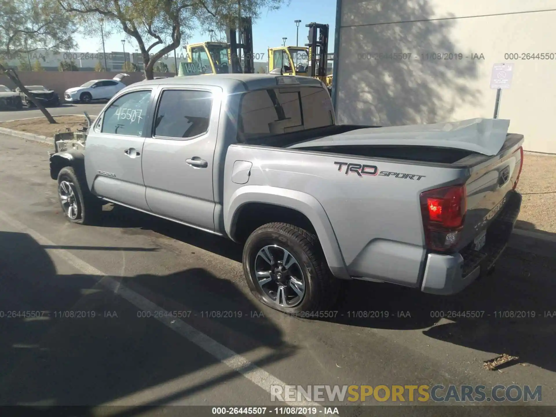 3 Photograph of a damaged car 3TMAZ5CN9KM101603 TOYOTA TACOMA 2019