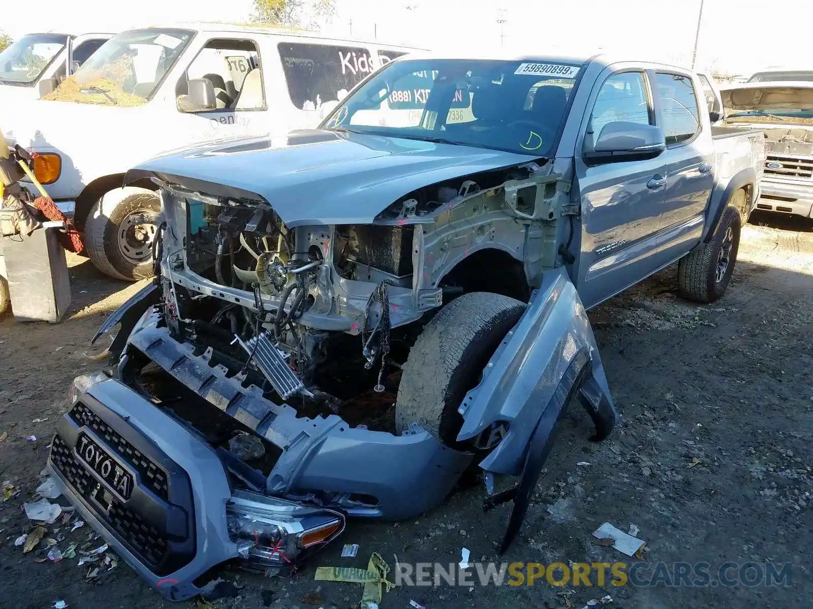 2 Photograph of a damaged car 3TMAZ5CN9KM101973 TOYOTA TACOMA 2019