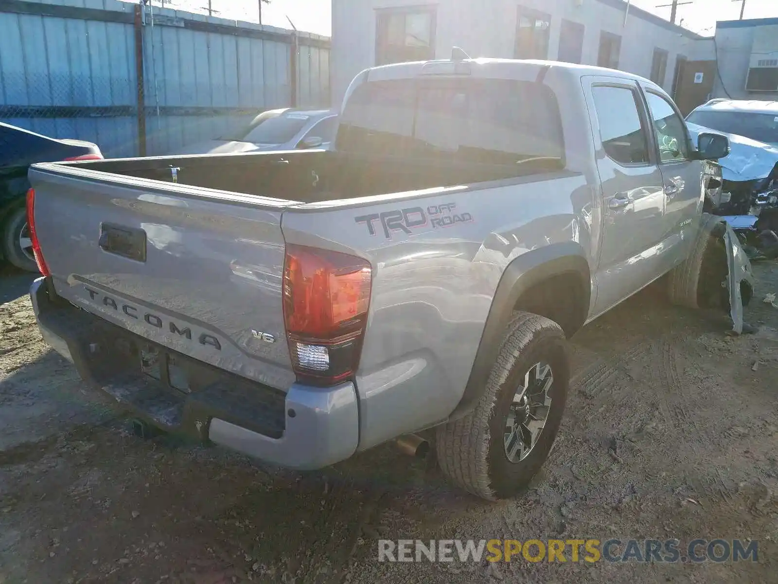 4 Photograph of a damaged car 3TMAZ5CN9KM101973 TOYOTA TACOMA 2019