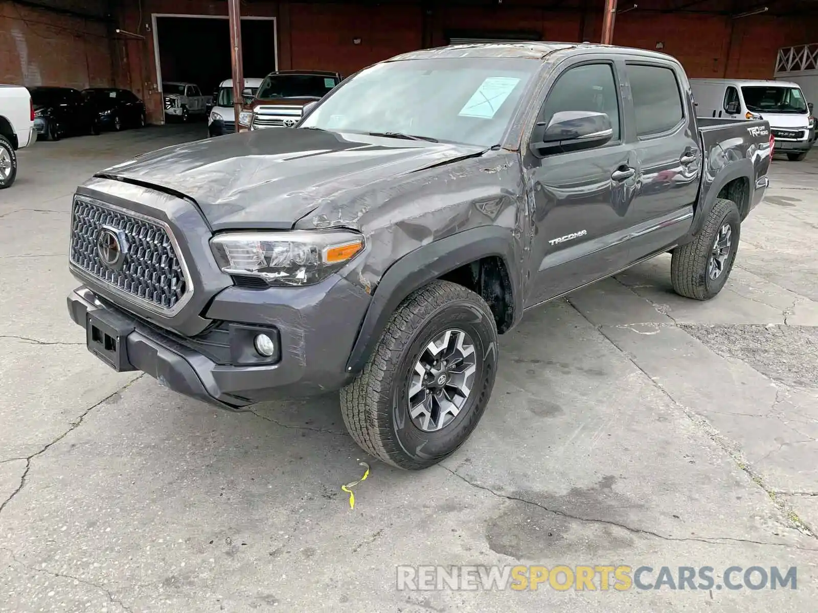 2 Photograph of a damaged car 3TMAZ5CN9KM102962 TOYOTA TACOMA 2019