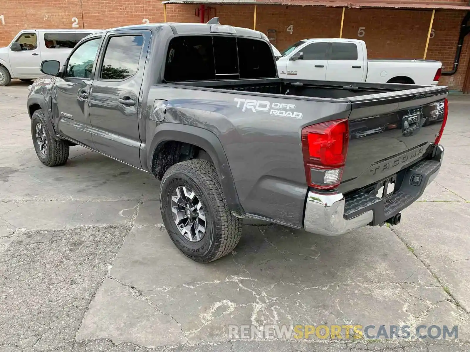 3 Photograph of a damaged car 3TMAZ5CN9KM102962 TOYOTA TACOMA 2019