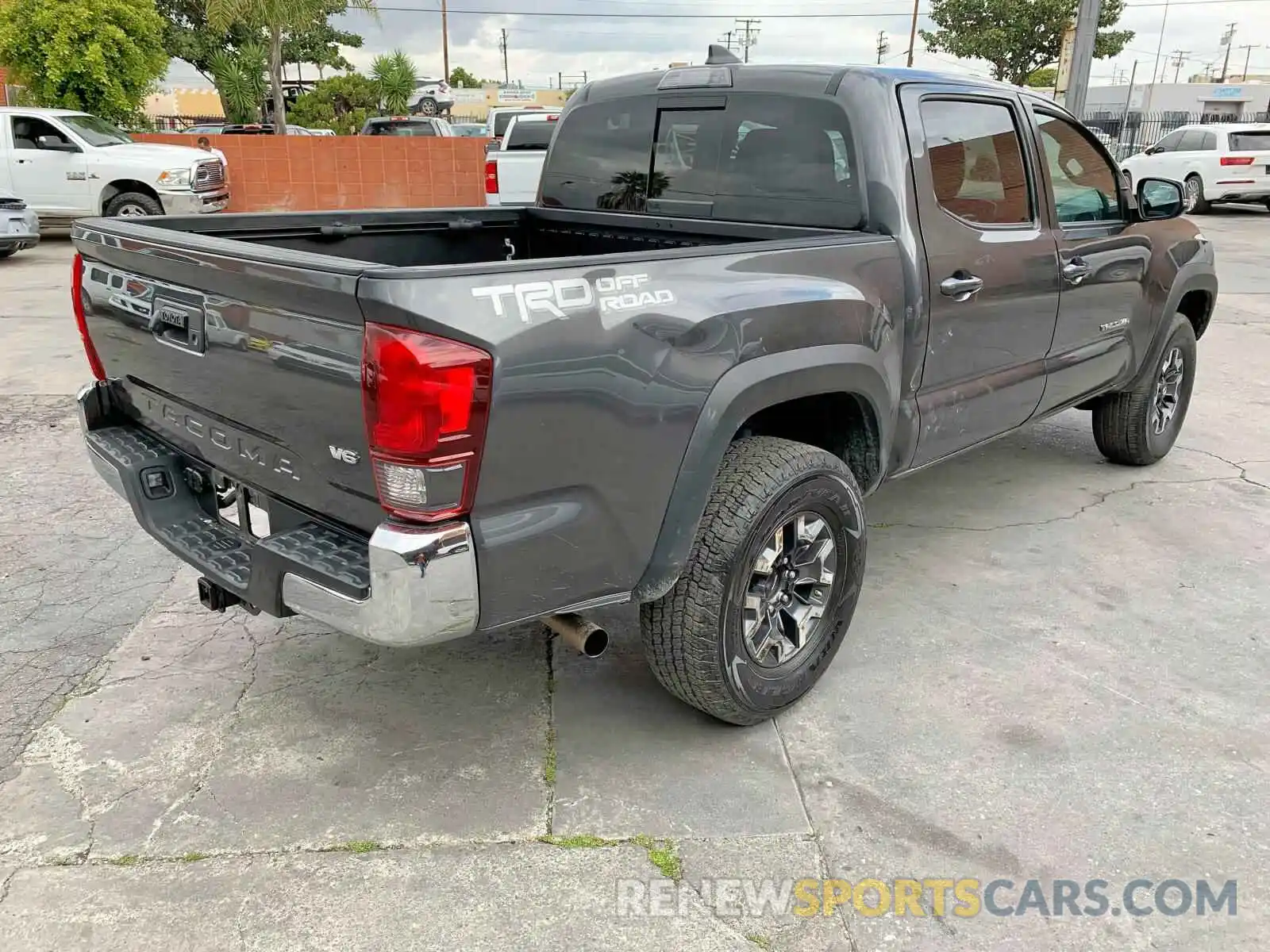 4 Photograph of a damaged car 3TMAZ5CN9KM102962 TOYOTA TACOMA 2019