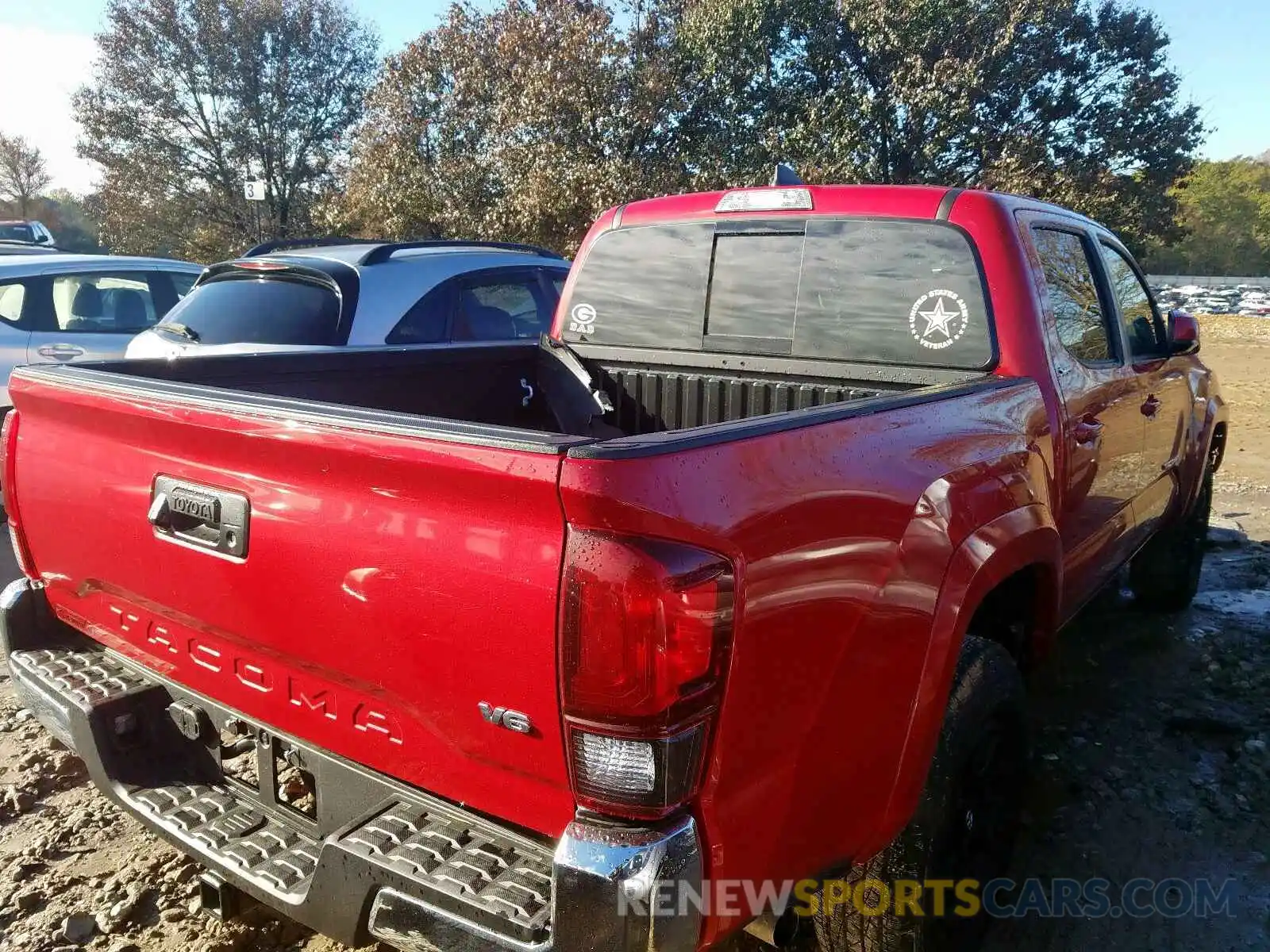 4 Photograph of a damaged car 3TMAZ5CN9KM104677 TOYOTA TACOMA 2019