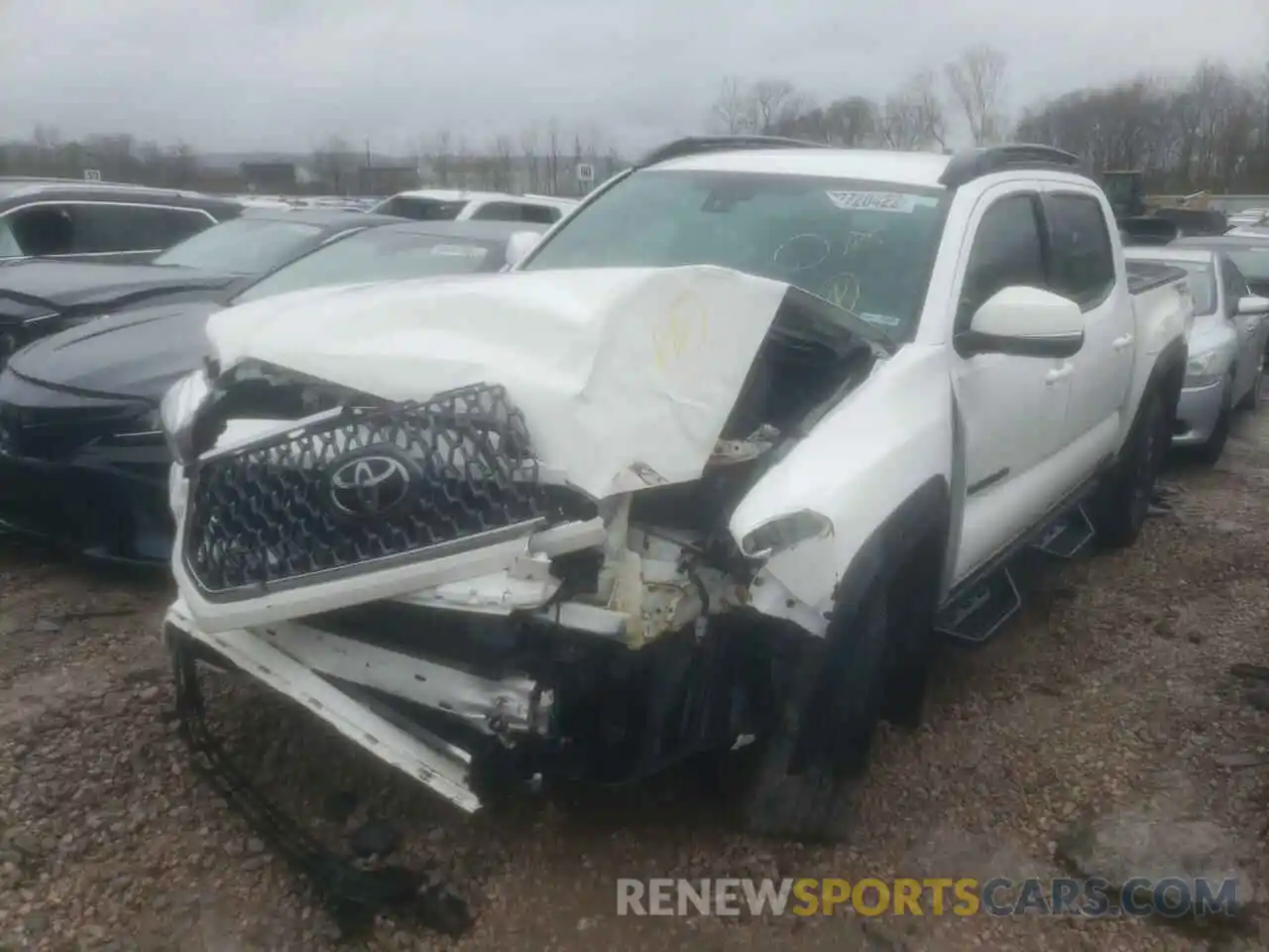 2 Photograph of a damaged car 3TMAZ5CN9KM108194 TOYOTA TACOMA 2019