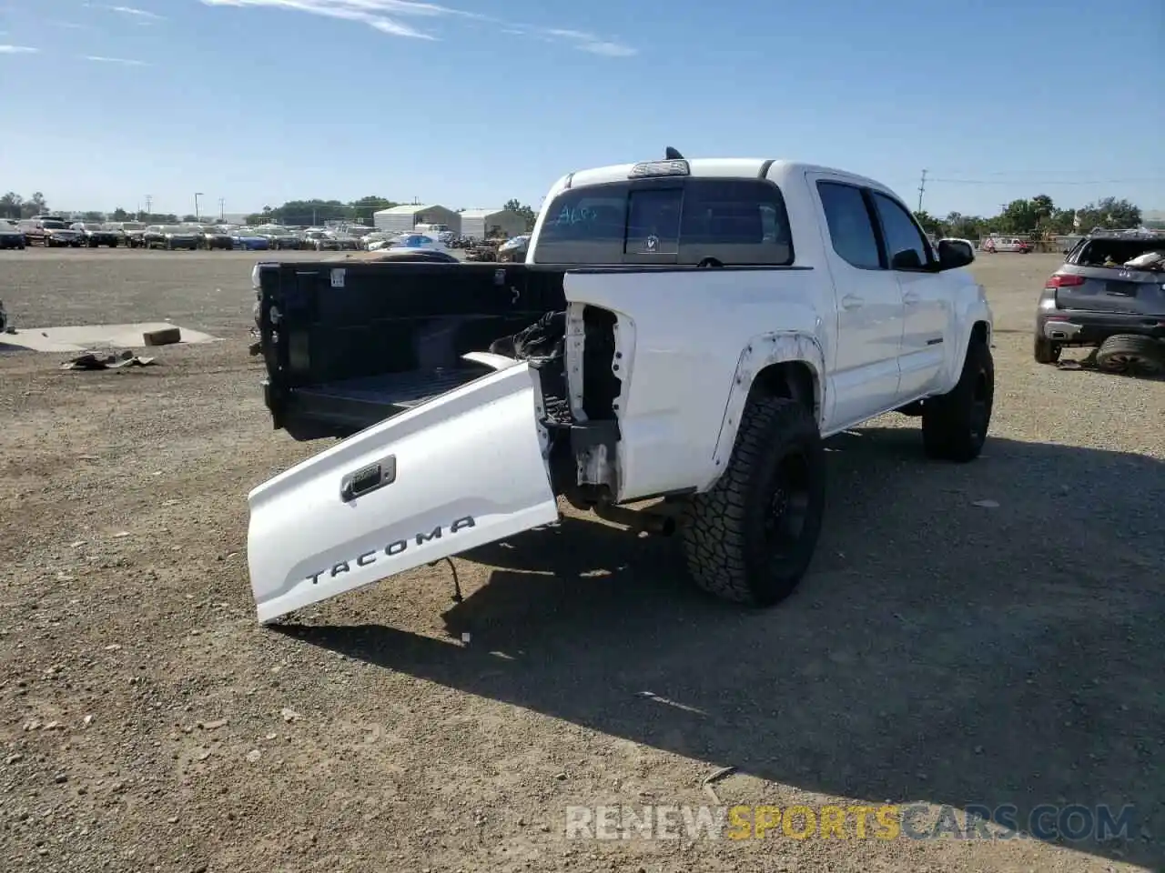 4 Photograph of a damaged car 3TMAZ5CN9KM109927 TOYOTA TACOMA 2019