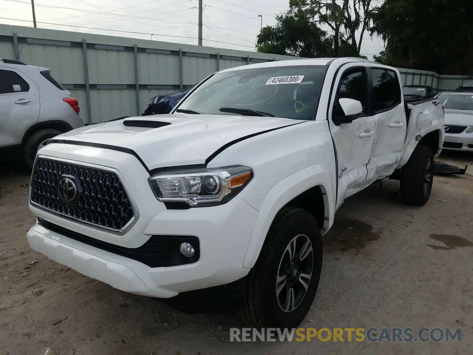 2 Photograph of a damaged car 3TMAZ5CN9KM110060 TOYOTA TACOMA 2019