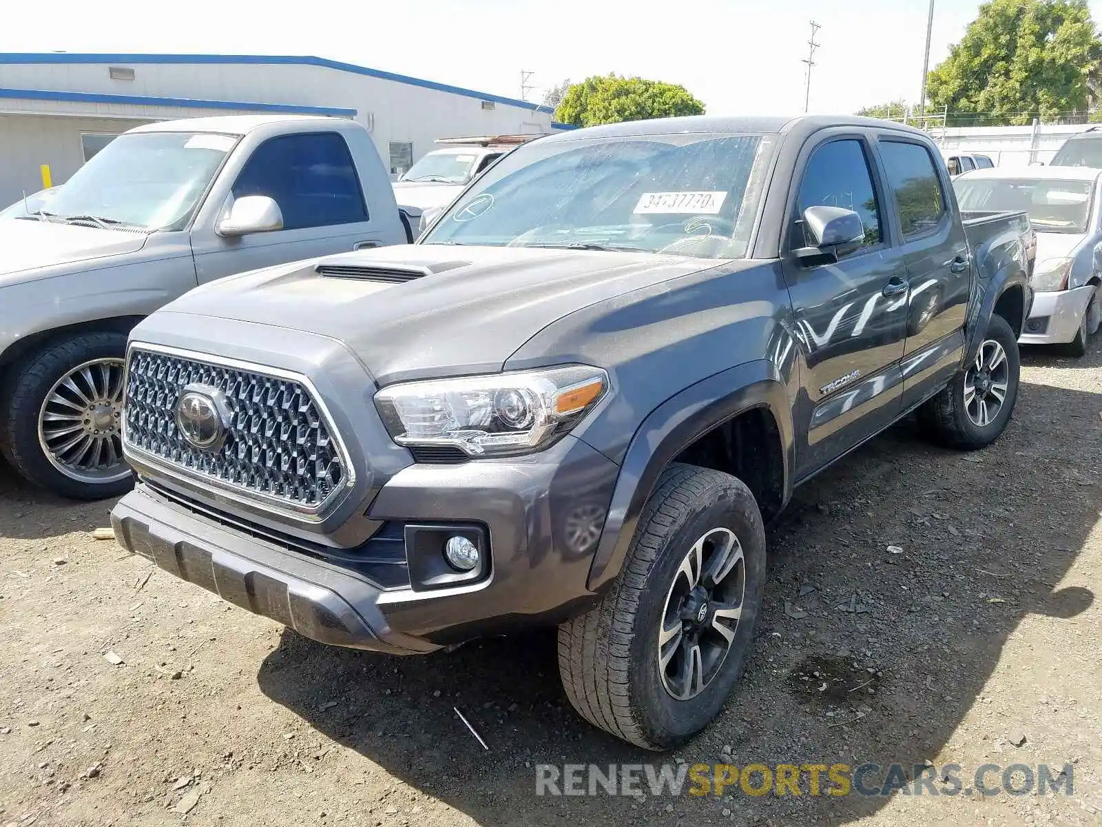 2 Photograph of a damaged car 3TMAZ5CN9KM111810 TOYOTA TACOMA 2019