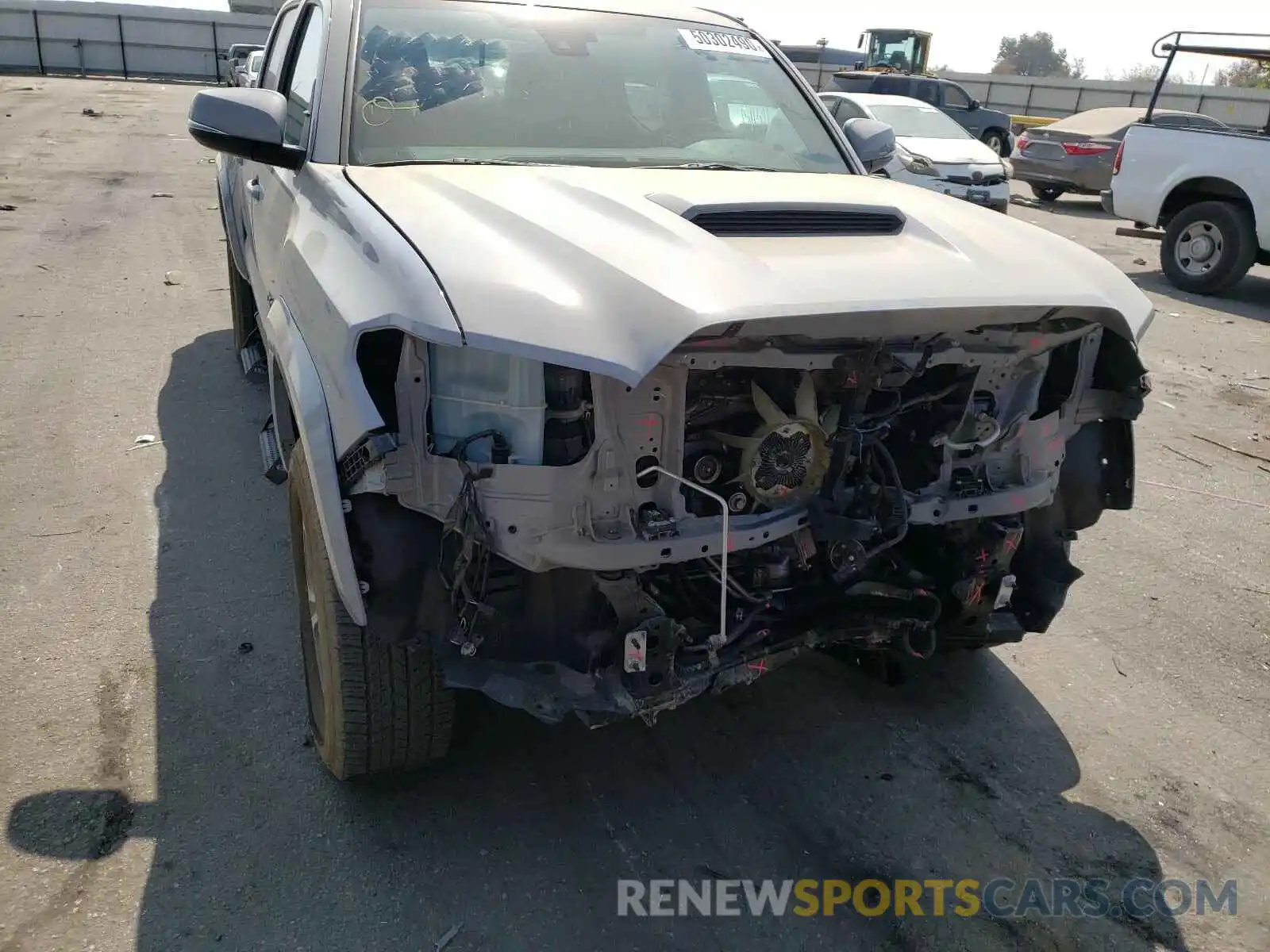 9 Photograph of a damaged car 3TMAZ5CN9KM111824 TOYOTA TACOMA 2019