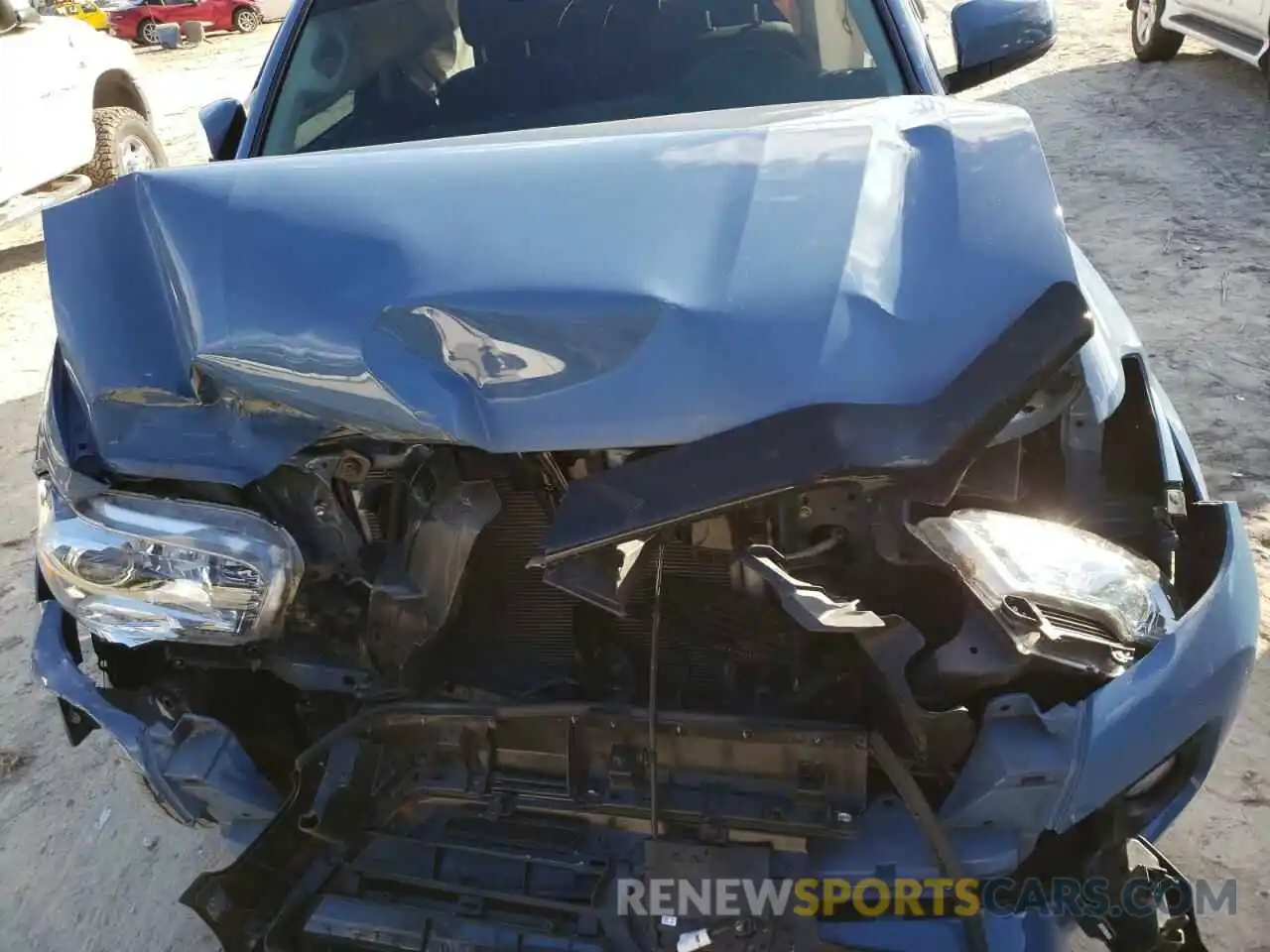 7 Photograph of a damaged car 3TMAZ5CNXKM081040 TOYOTA TACOMA 2019