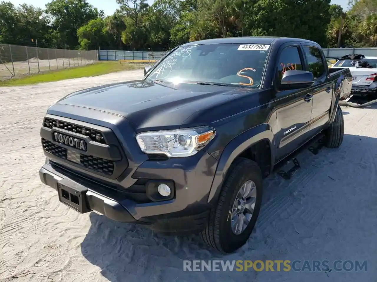 2 Photograph of a damaged car 3TMAZ5CNXKM081412 TOYOTA TACOMA 2019