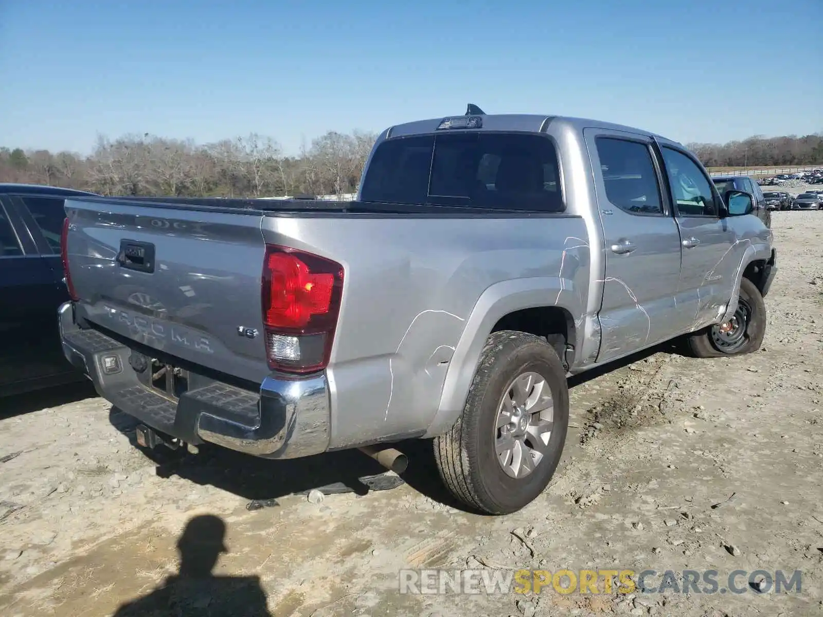 4 Photograph of a damaged car 3TMAZ5CNXKM084326 TOYOTA TACOMA 2019