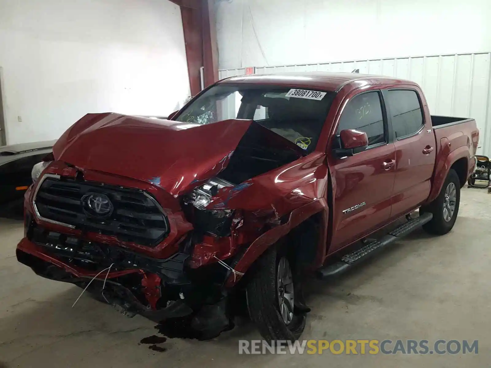 2 Photograph of a damaged car 3TMAZ5CNXKM084357 TOYOTA TACOMA 2019