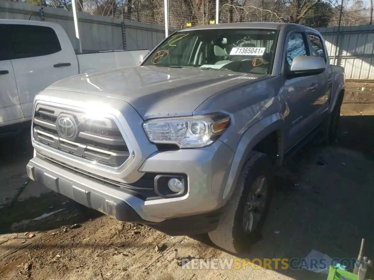 2 Photograph of a damaged car 3TMAZ5CNXKM085038 TOYOTA TACOMA 2019