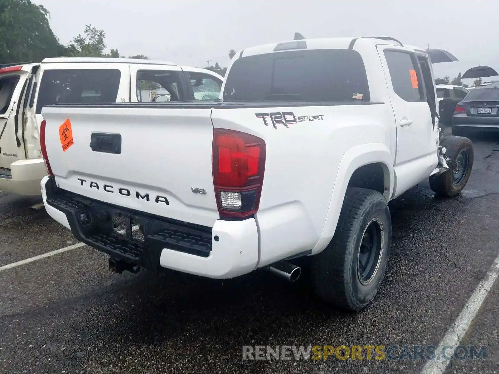 4 Photograph of a damaged car 3TMAZ5CNXKM085976 TOYOTA TACOMA 2019