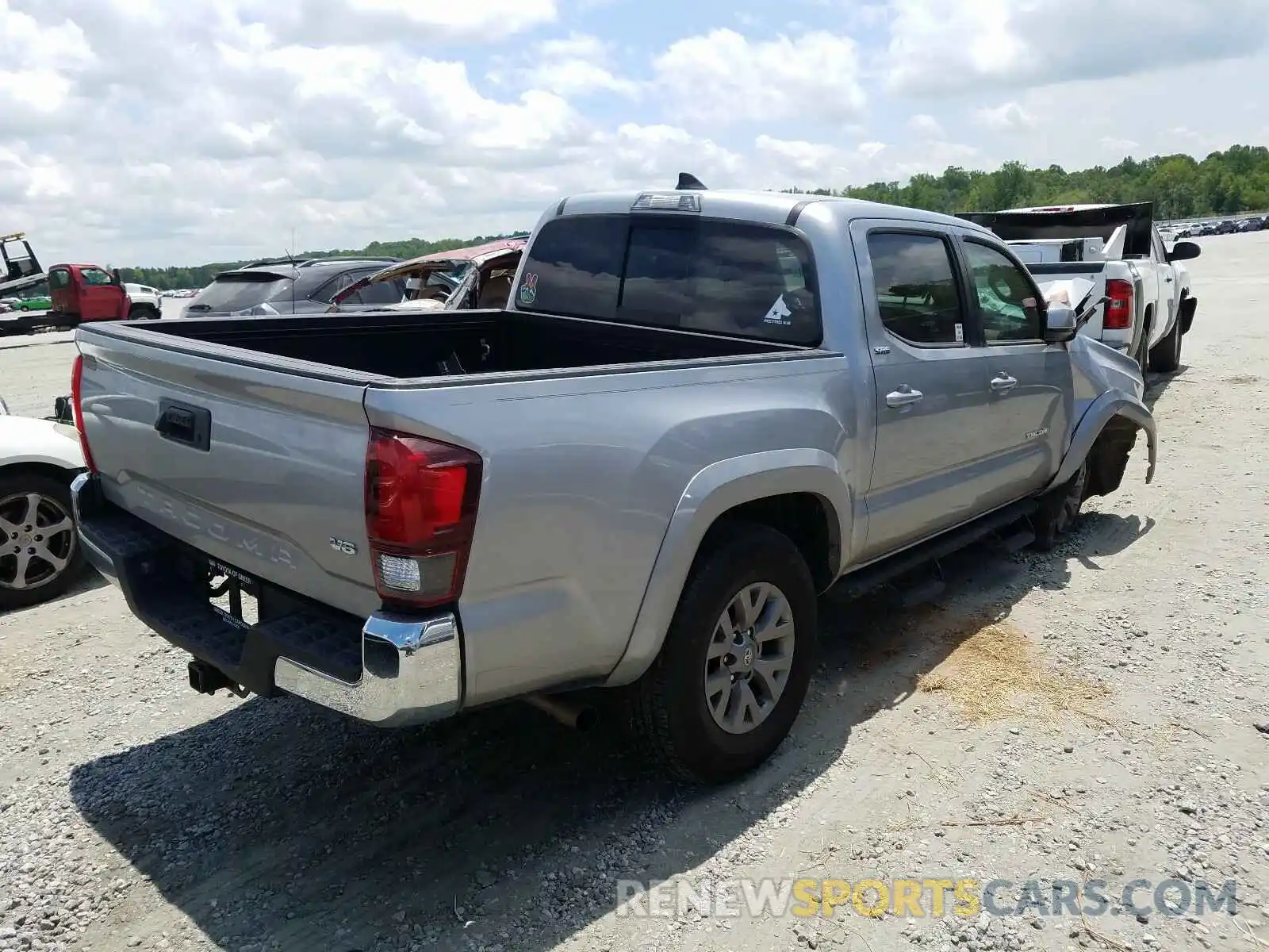 4 Photograph of a damaged car 3TMAZ5CNXKM086366 TOYOTA TACOMA 2019