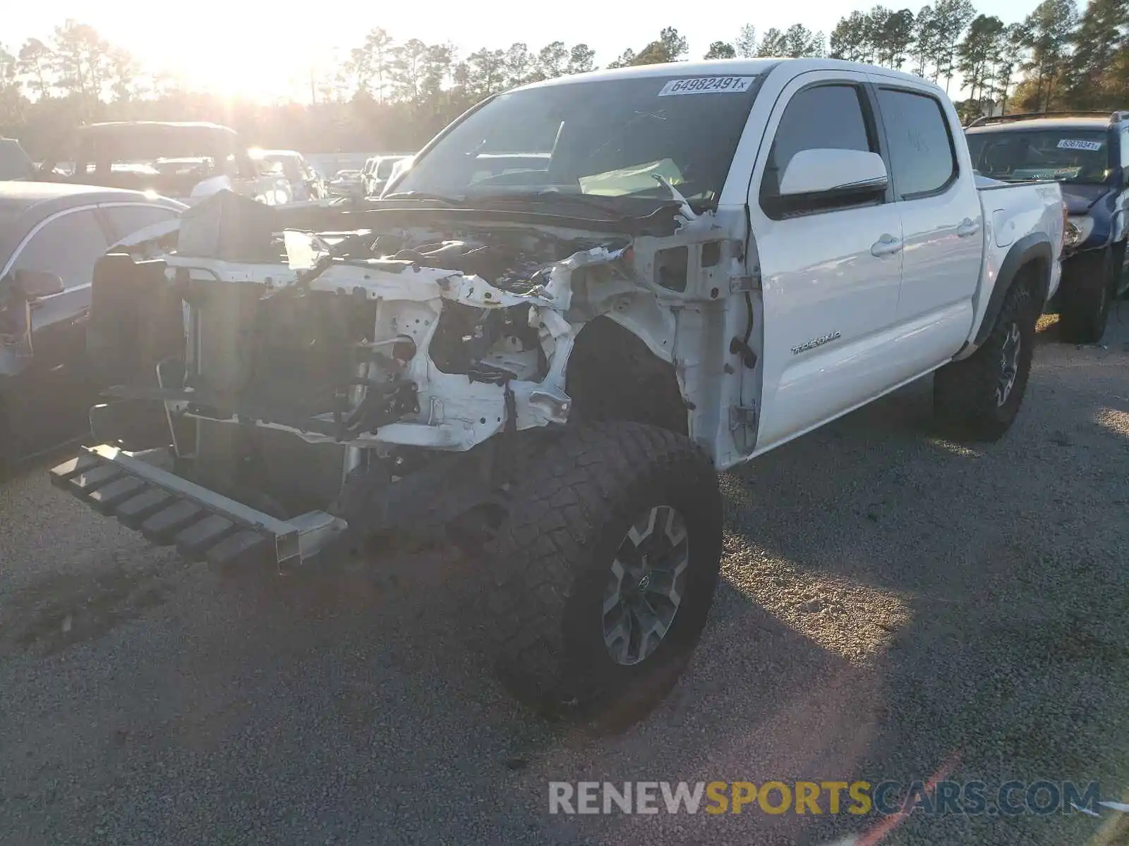 2 Photograph of a damaged car 3TMAZ5CNXKM089705 TOYOTA TACOMA 2019