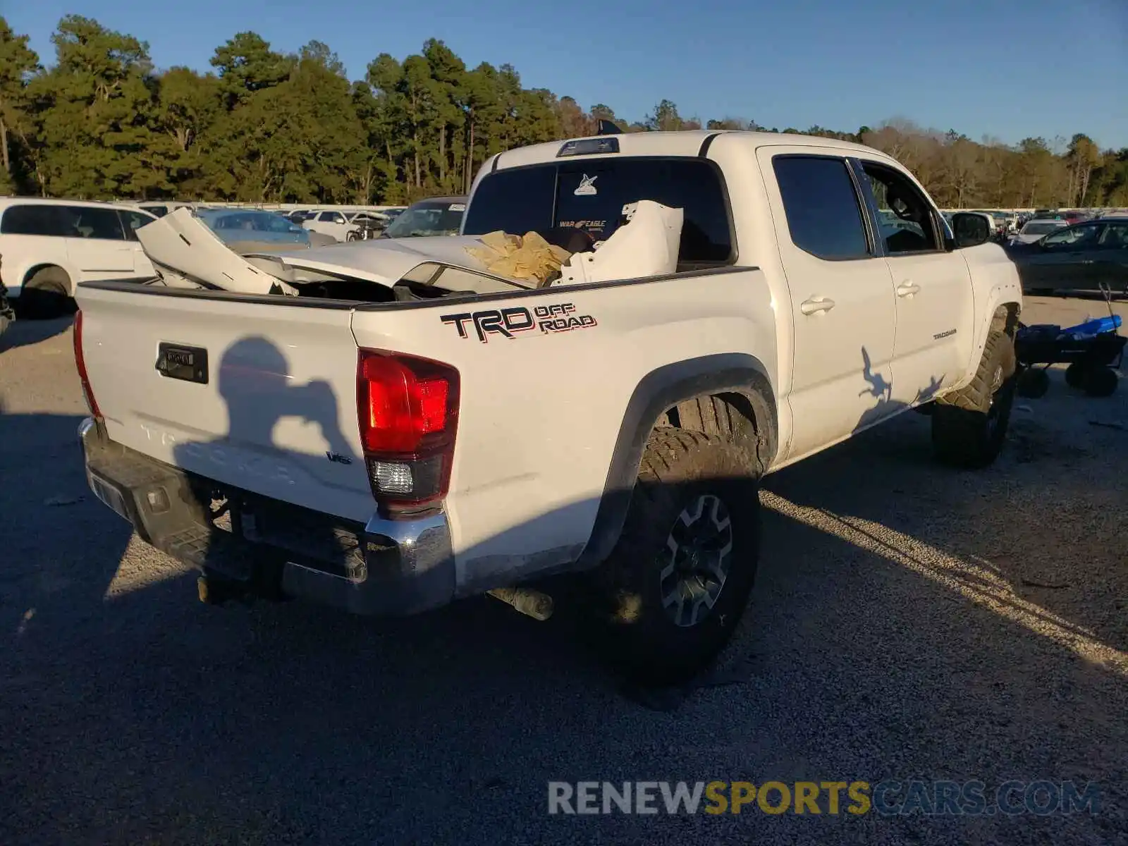 4 Photograph of a damaged car 3TMAZ5CNXKM089705 TOYOTA TACOMA 2019