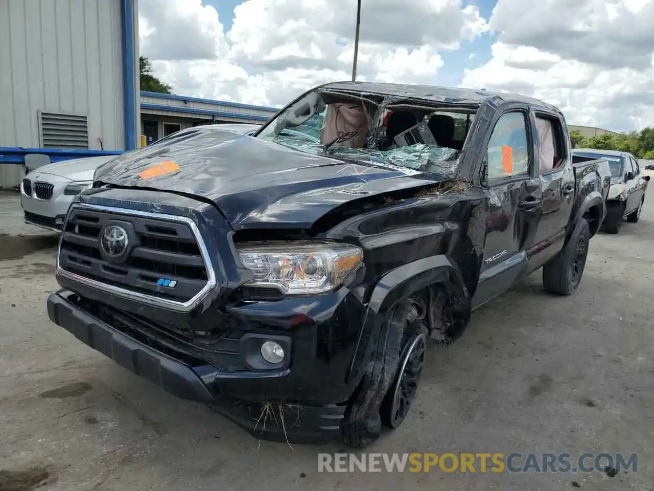 2 Photograph of a damaged car 3TMAZ5CNXKM092149 TOYOTA TACOMA 2019