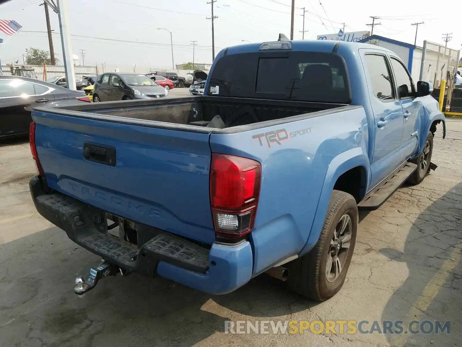 4 Photograph of a damaged car 3TMAZ5CNXKM093253 TOYOTA TACOMA 2019