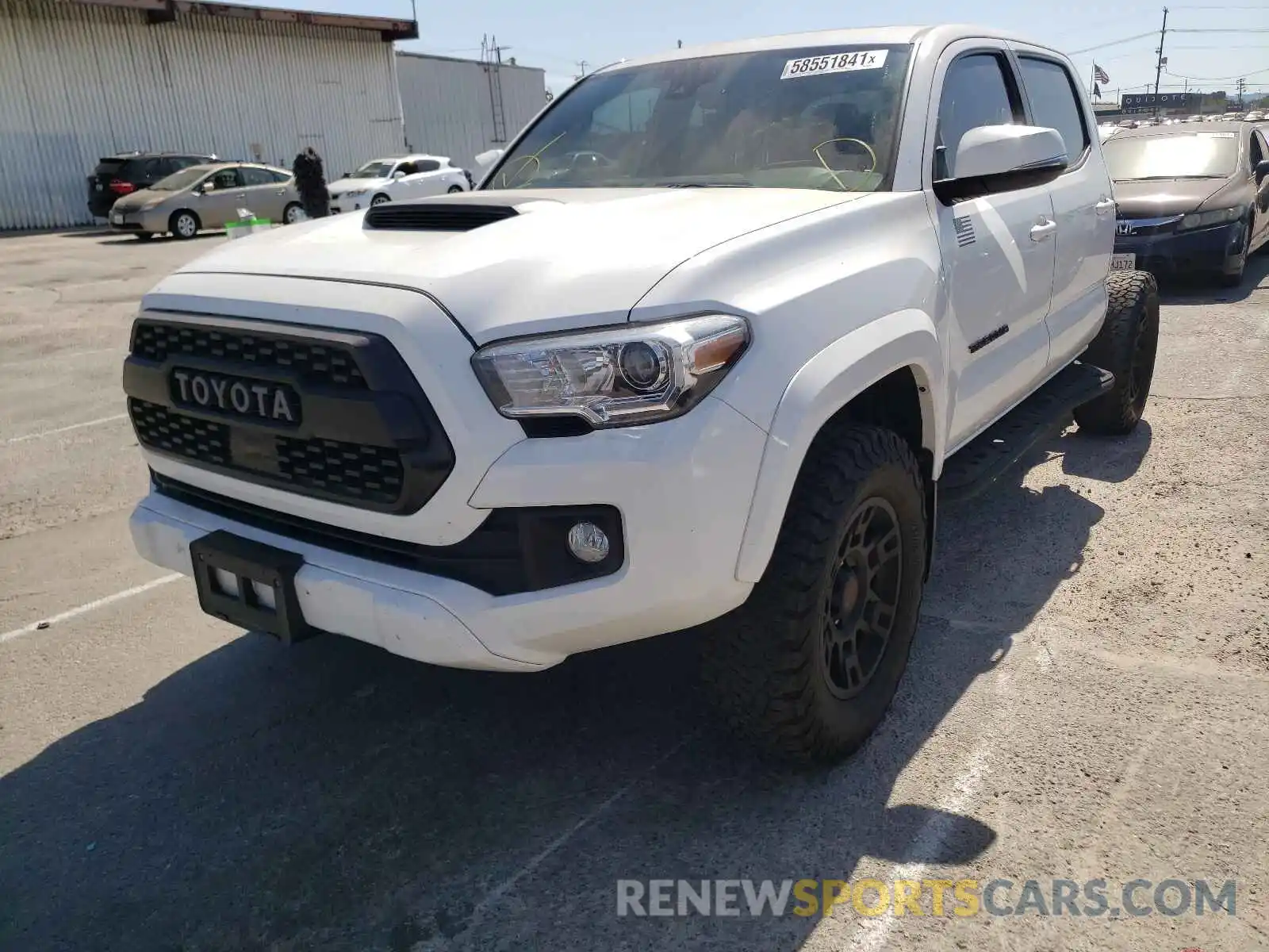 2 Photograph of a damaged car 3TMAZ5CNXKM094497 TOYOTA TACOMA 2019