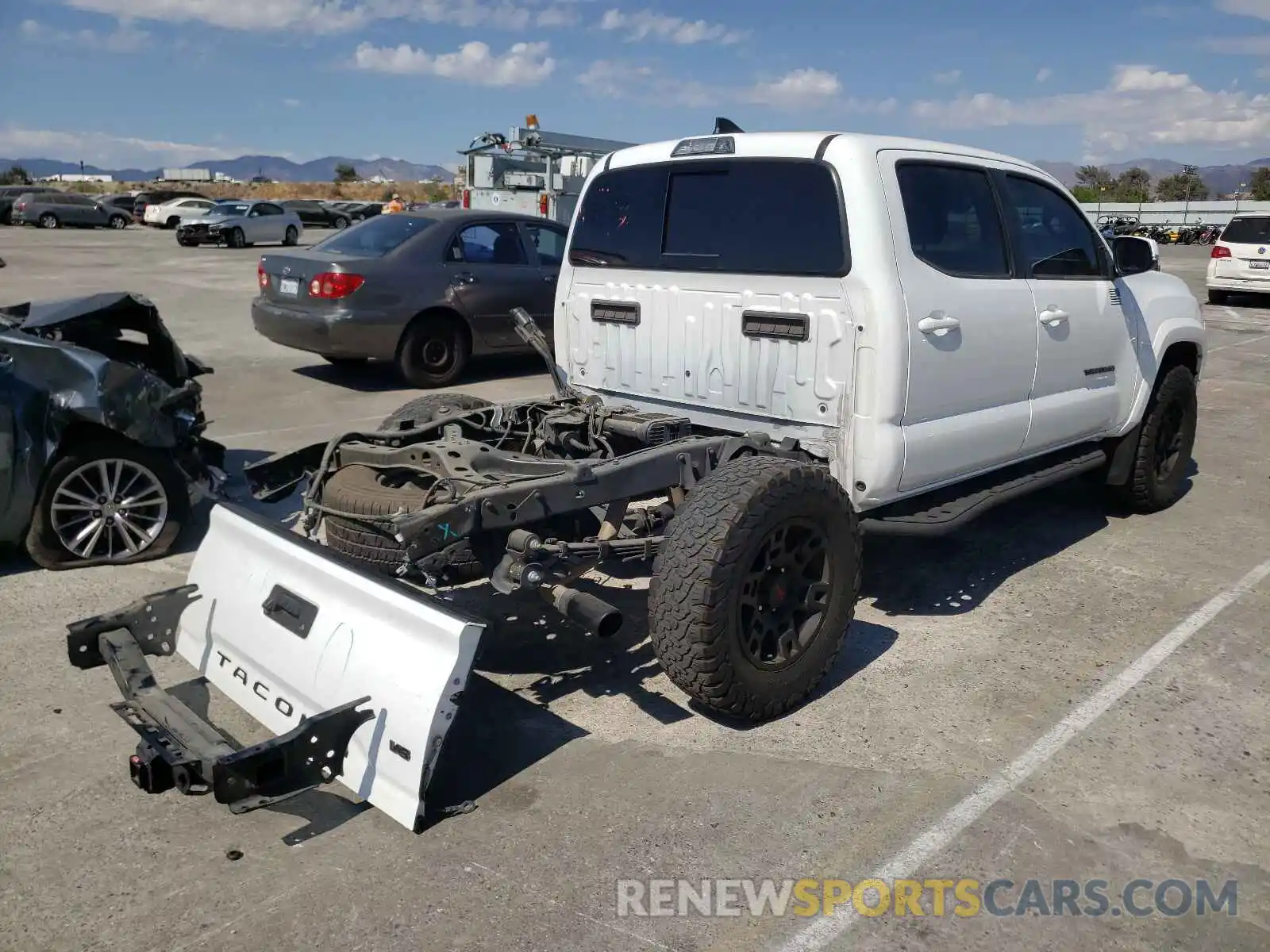 4 Photograph of a damaged car 3TMAZ5CNXKM094497 TOYOTA TACOMA 2019