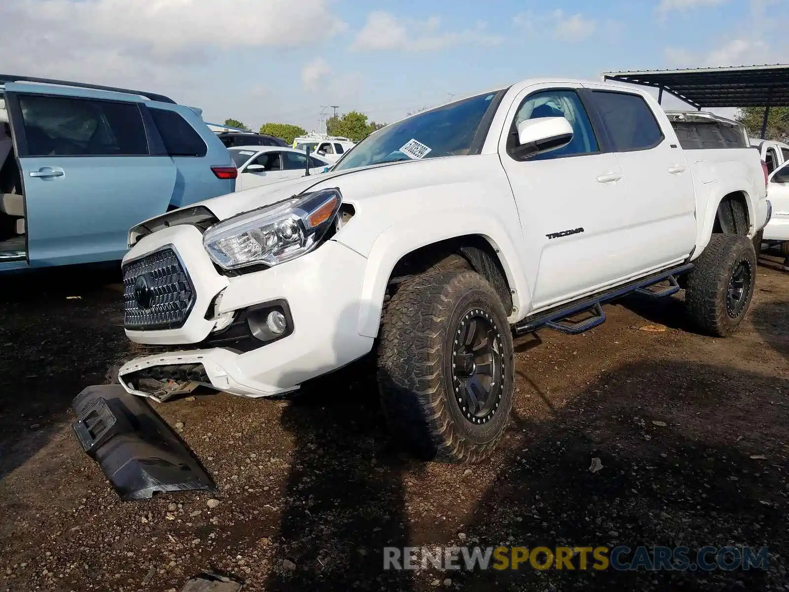 2 Photograph of a damaged car 3TMAZ5CNXKM096671 TOYOTA TACOMA 2019