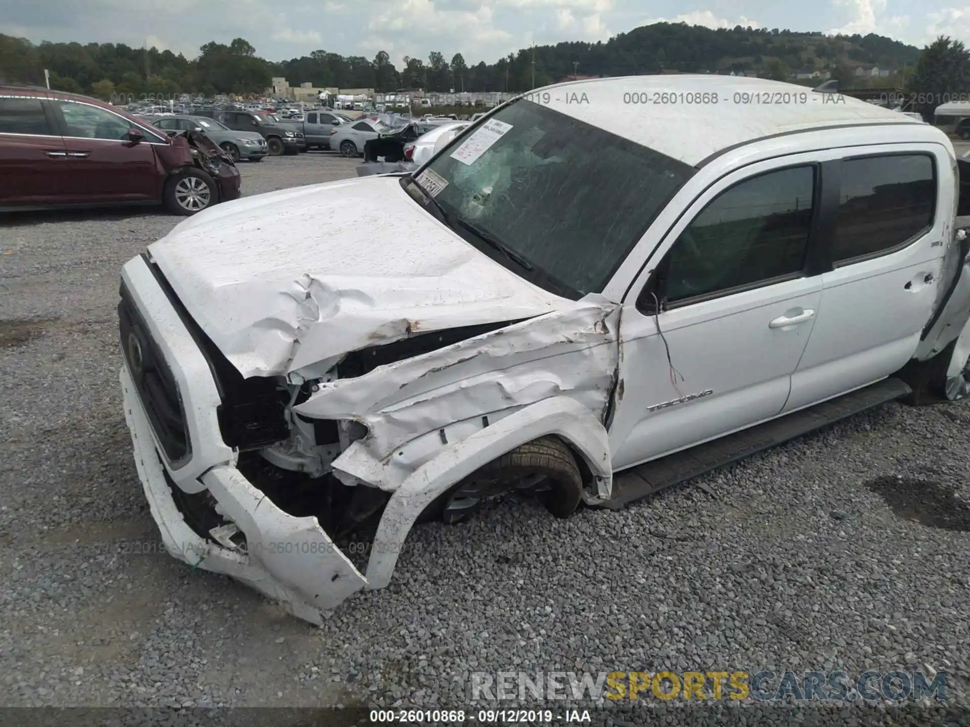 2 Photograph of a damaged car 3TMAZ5CNXKM097237 TOYOTA TACOMA 2019