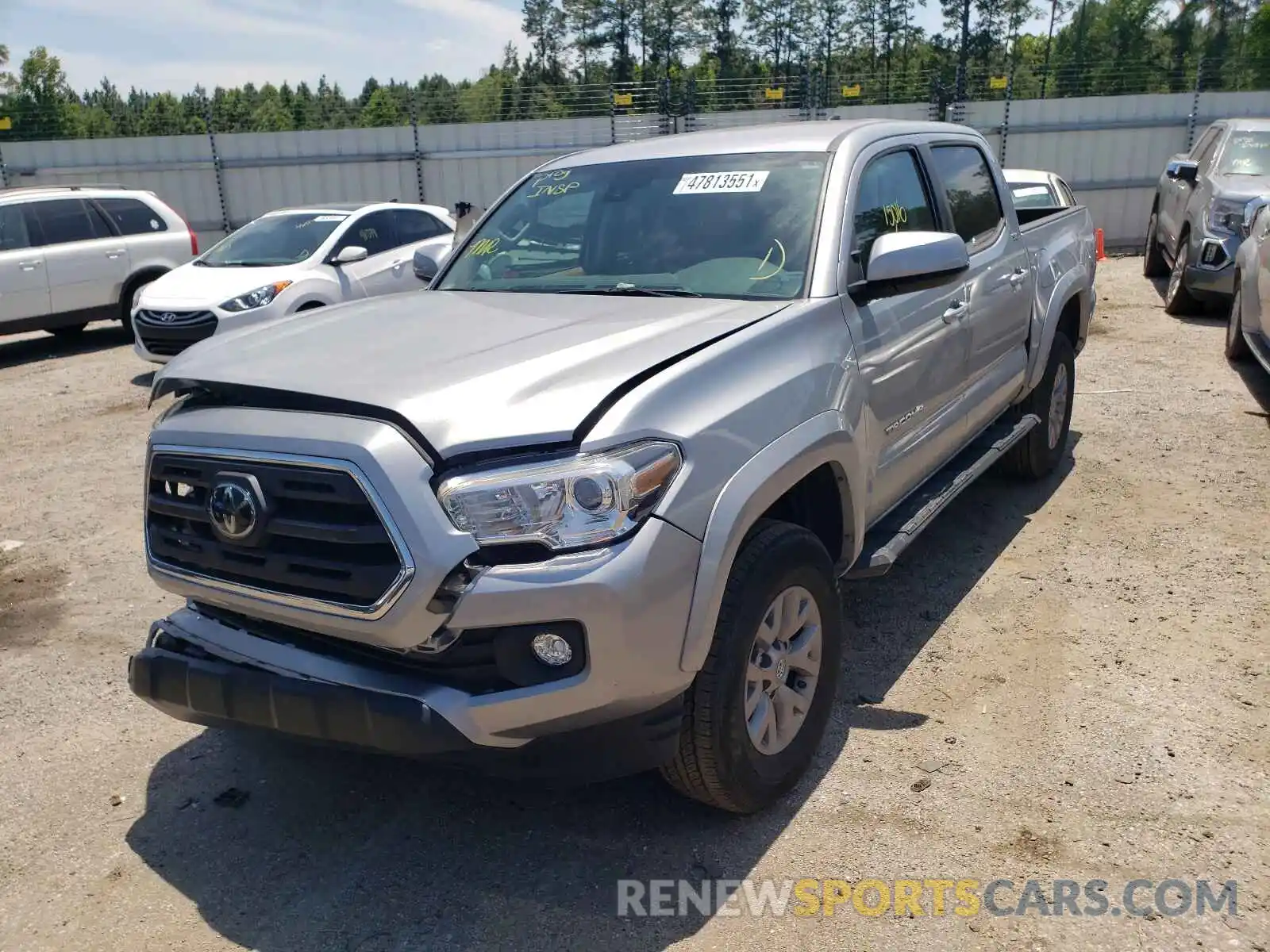 2 Photograph of a damaged car 3TMAZ5CNXKM100721 TOYOTA TACOMA 2019