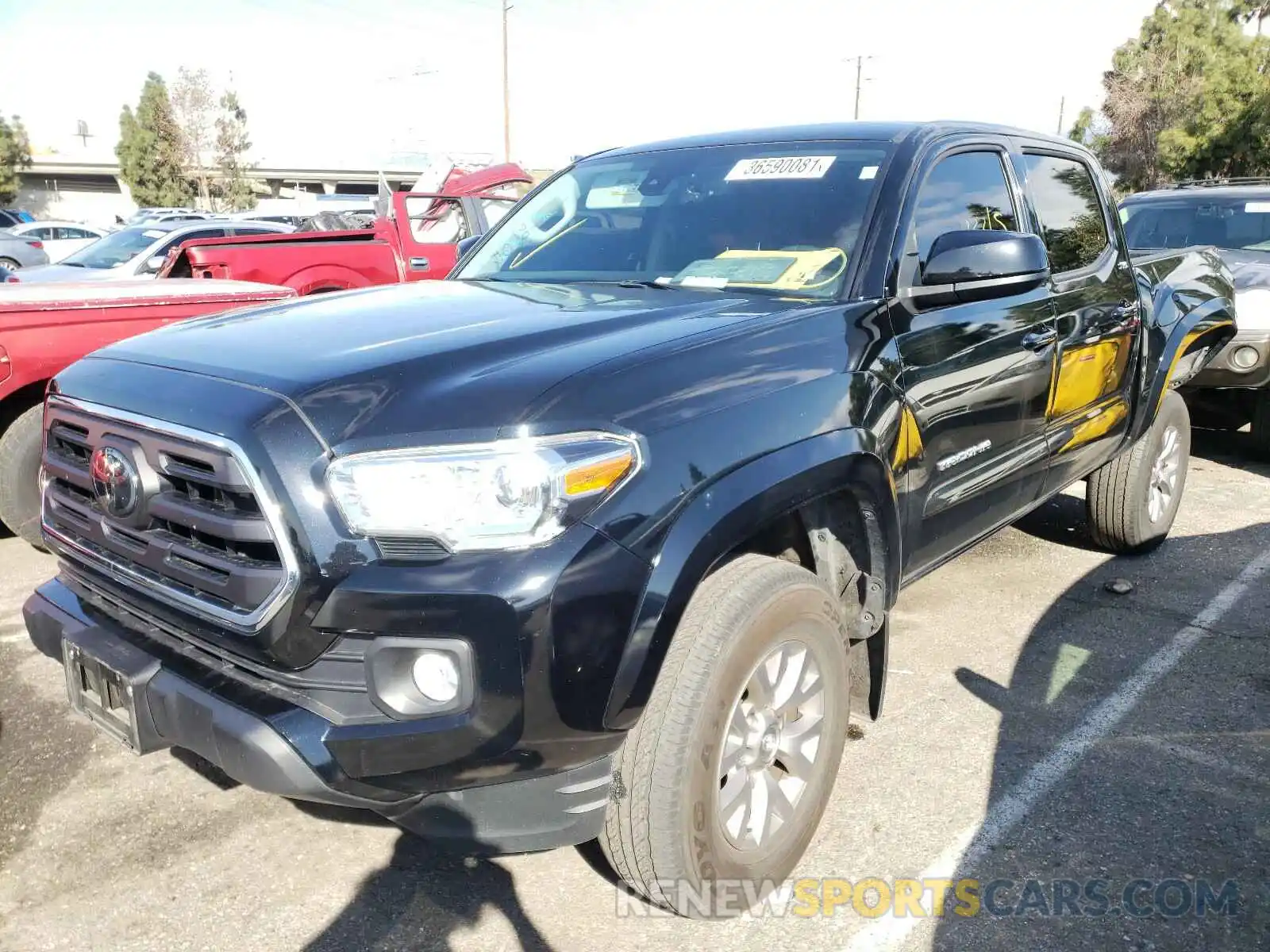 2 Photograph of a damaged car 3TMAZ5CNXKM101867 TOYOTA TACOMA 2019