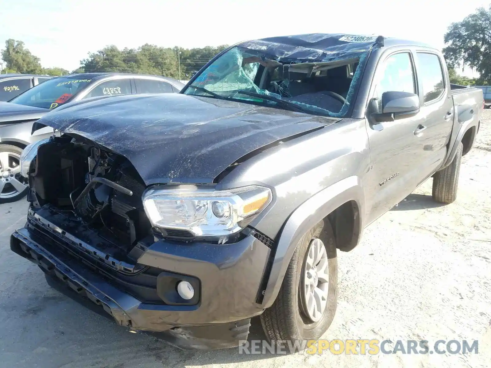 2 Photograph of a damaged car 3TMAZ5CNXKM102016 TOYOTA TACOMA 2019