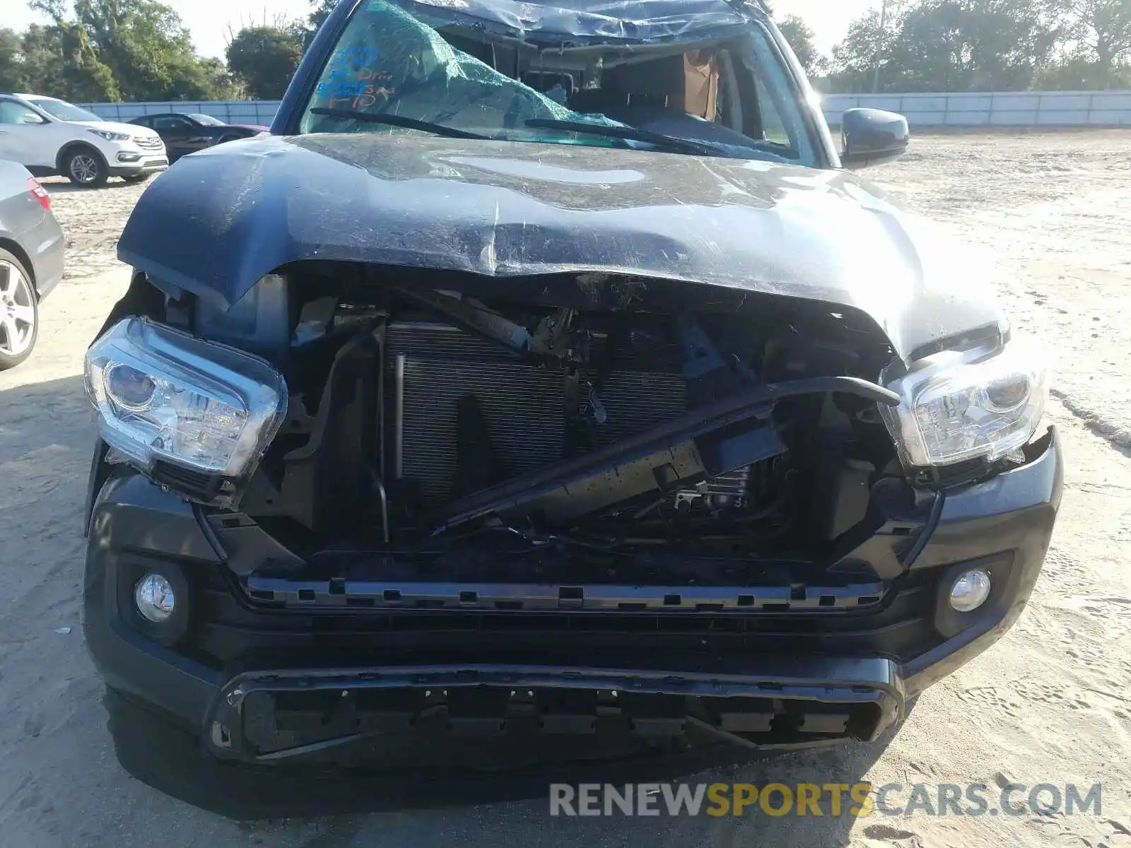 9 Photograph of a damaged car 3TMAZ5CNXKM102016 TOYOTA TACOMA 2019