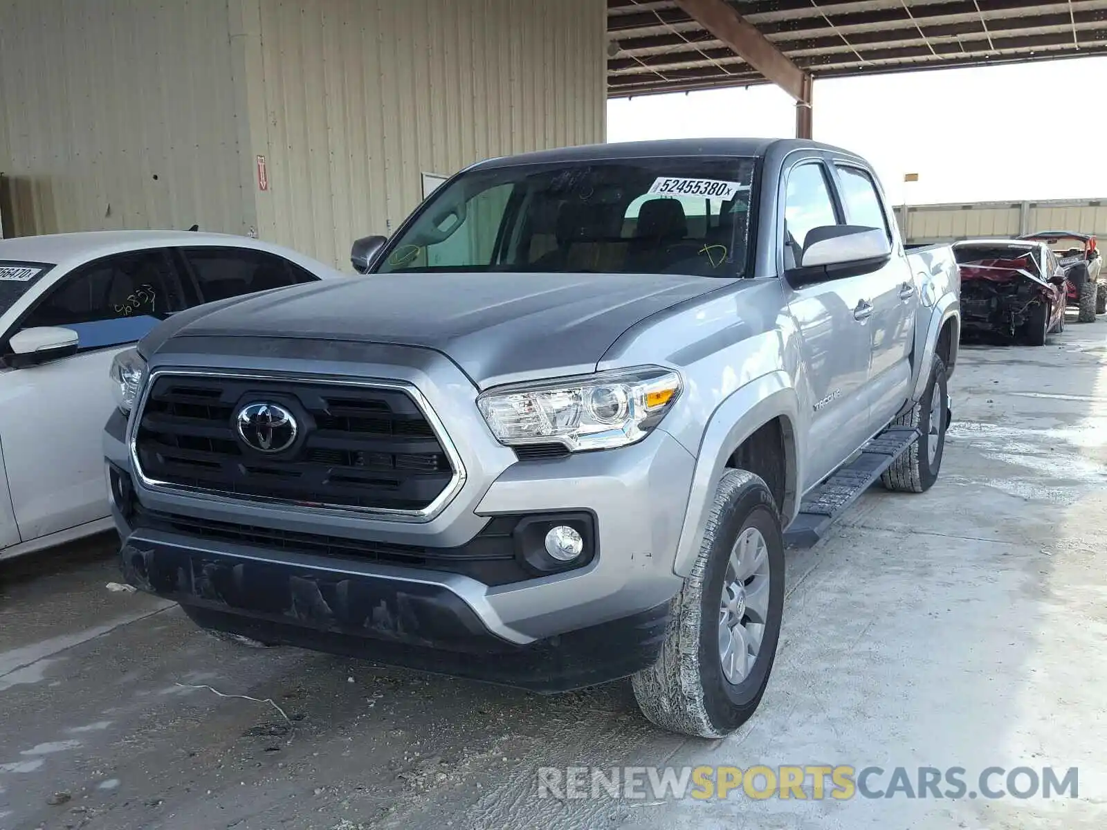 2 Photograph of a damaged car 3TMAZ5CNXKM102727 TOYOTA TACOMA 2019