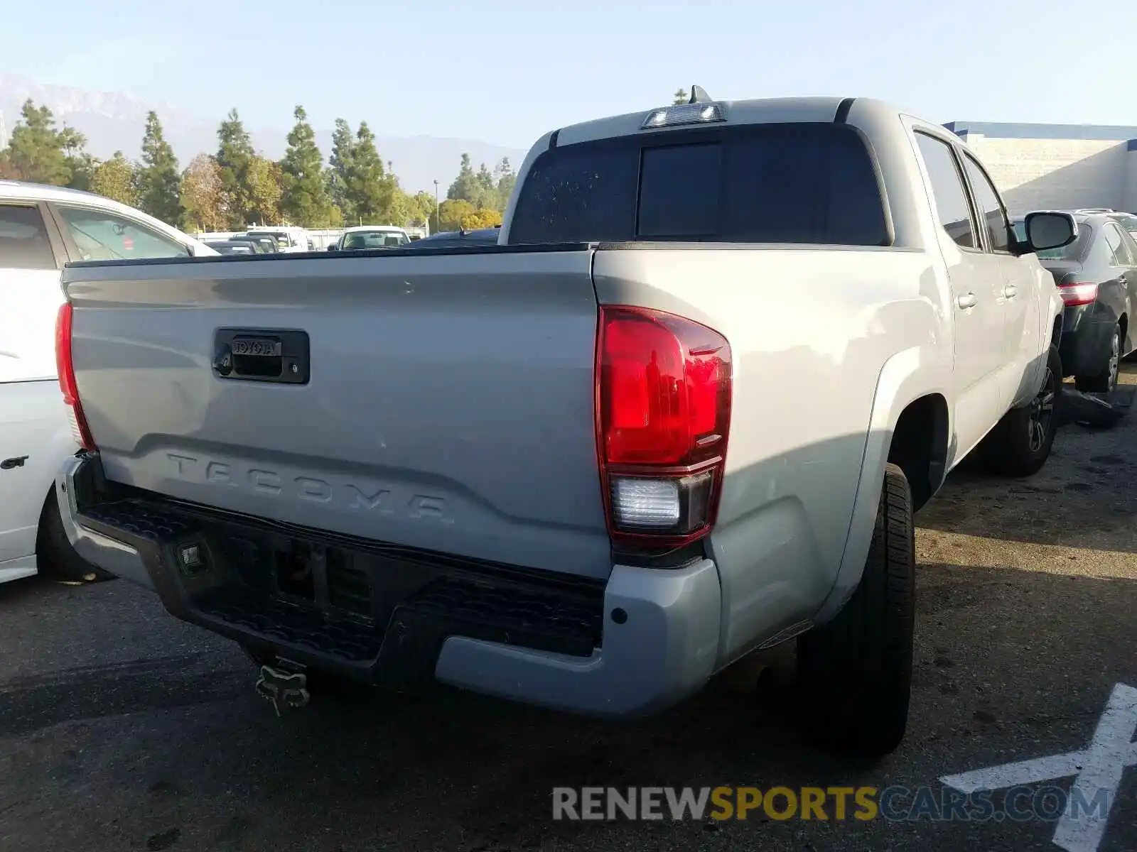 4 Photograph of a damaged car 3TMAZ5CNXKM102775 TOYOTA TACOMA 2019