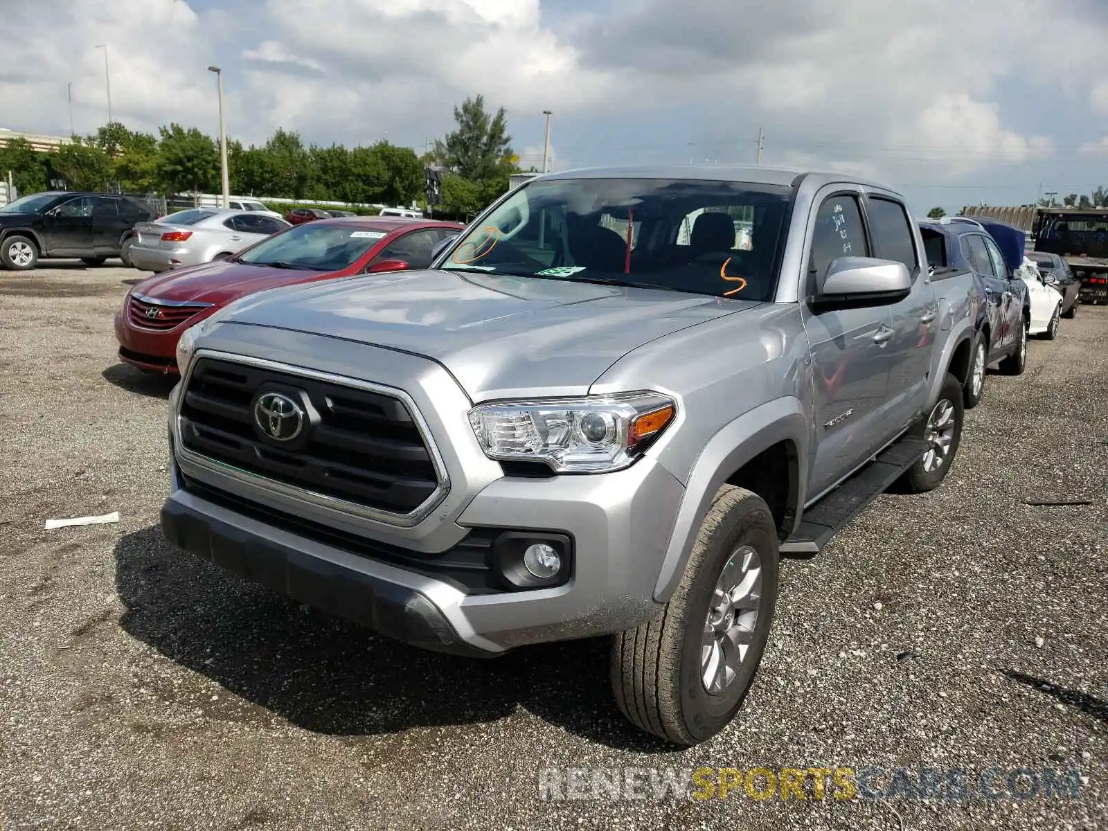 2 Photograph of a damaged car 3TMAZ5CNXKM103618 TOYOTA TACOMA 2019