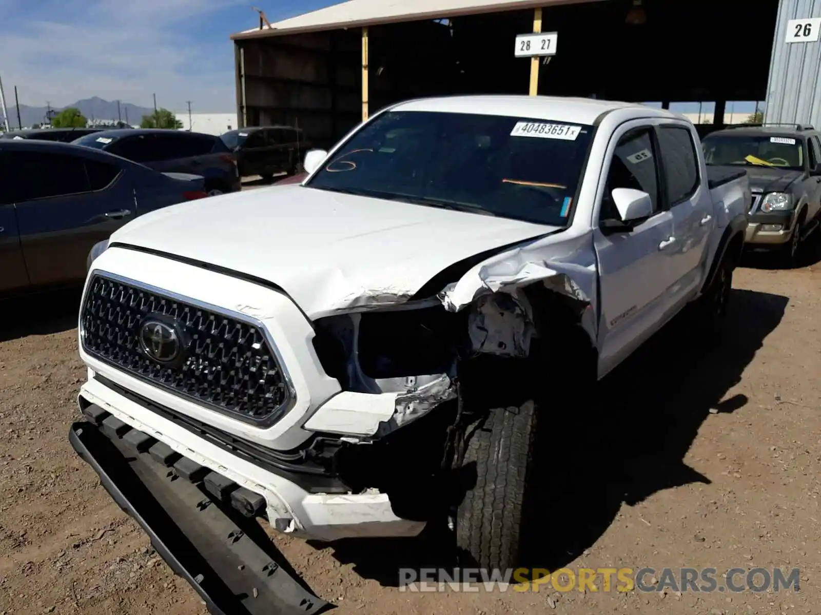 2 Photograph of a damaged car 3TMAZ5CNXKM105823 TOYOTA TACOMA 2019