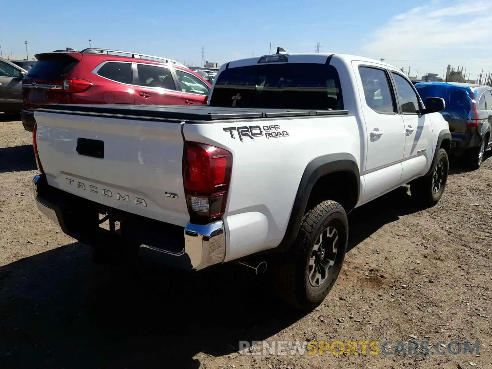 4 Photograph of a damaged car 3TMAZ5CNXKM105823 TOYOTA TACOMA 2019