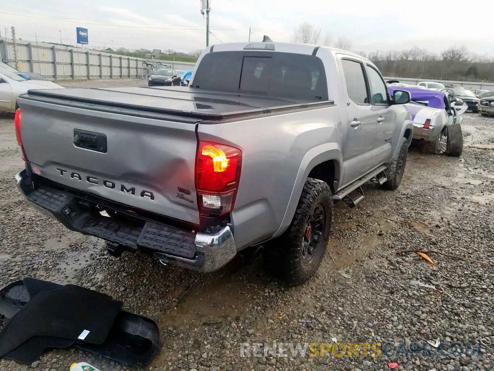 4 Photograph of a damaged car 3TMAZ5CNXKM108690 TOYOTA TACOMA 2019