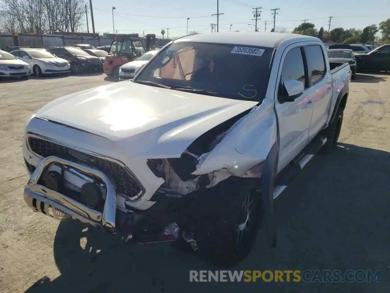 2 Photograph of a damaged car 3TMAZ5CNXKM109340 TOYOTA TACOMA 2019