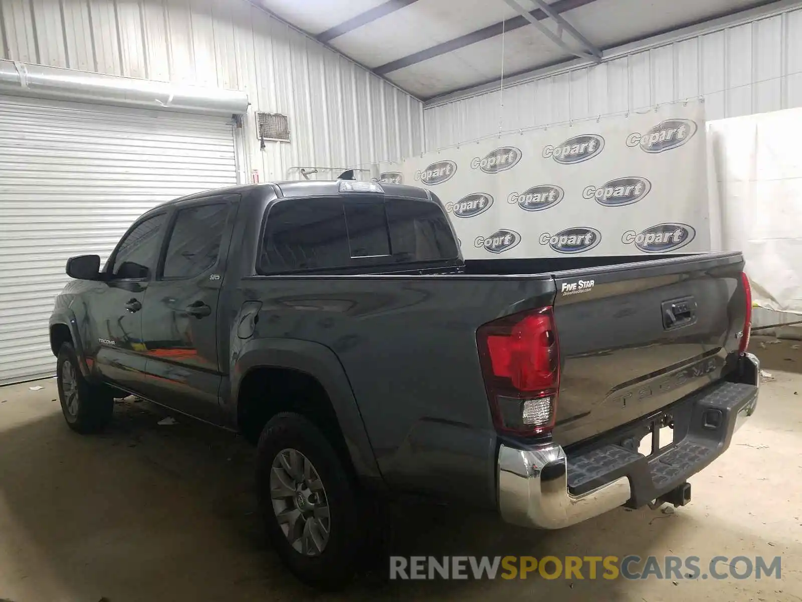 3 Photograph of a damaged car 3TMAZ5CNXKM109662 TOYOTA TACOMA 2019