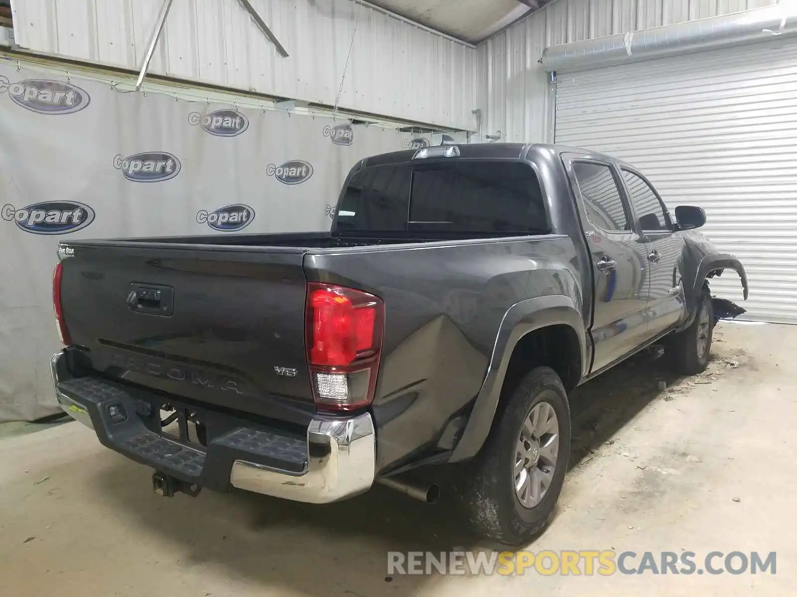 4 Photograph of a damaged car 3TMAZ5CNXKM109662 TOYOTA TACOMA 2019