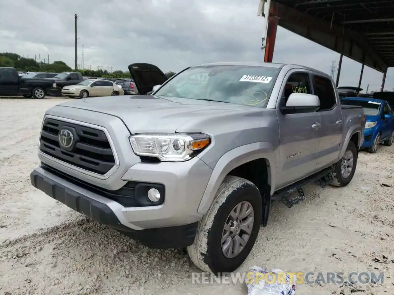 2 Photograph of a damaged car 3TMAZ5CNXKM110472 TOYOTA TACOMA 2019